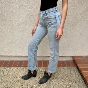 Vintage Levi’s, light wash denim.